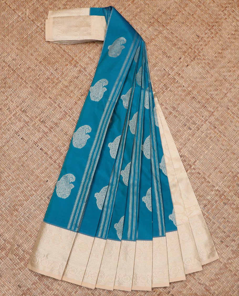Blue Budget Silk Saree Adorned with Paisley Zari Buttas, Complemented by a Contrast Traditional Zari Border, a Zari-Design Detailed Pallu, and a Contrast Zari-Bordered Blouse