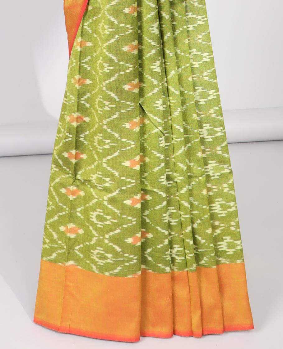 Green argyle design ikkat cotton with contast plain border & butta design pallu