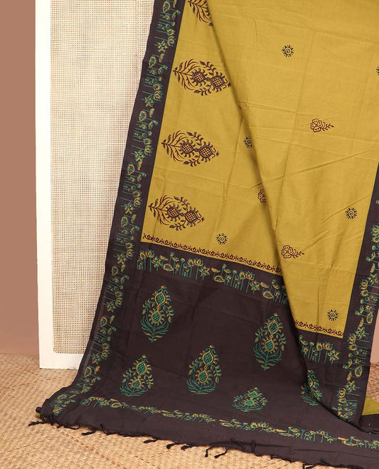 Yellow unique motifs printed poly cotton saree, contrast floral motif block printed border, and block printed motif pallu