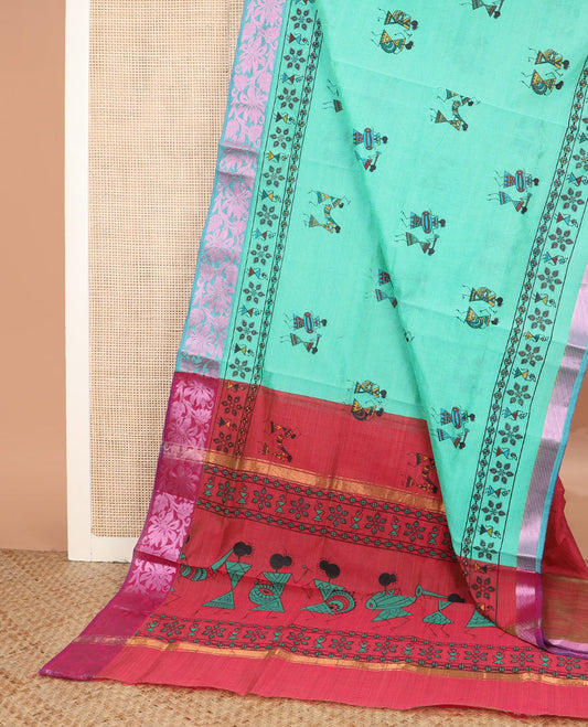 Turquoise warli village printed Andhra cotton saree, zari floral creeper border, and contrast warli printed pallu