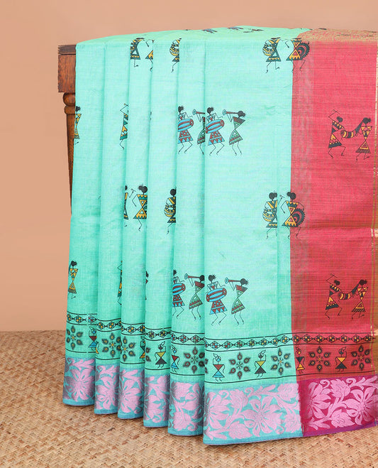 Turquoise warli village printed Andhra cotton saree, zari floral creeper border, and contrast warli printed pallu
