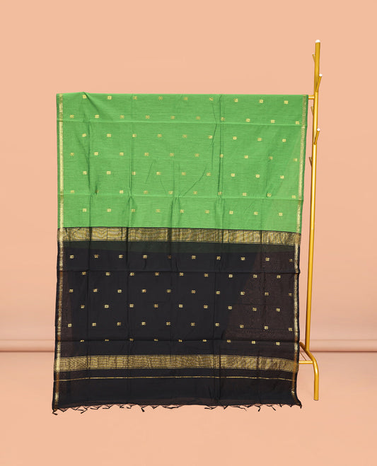 Green Maheshwari Cotton Saree, Accentuated with Buttas All Over Its Body, Subtle Zari Piping Border, Complemented by a Contrast Pallu Steeped with Buttas, and Paired with a Contrast Blouse