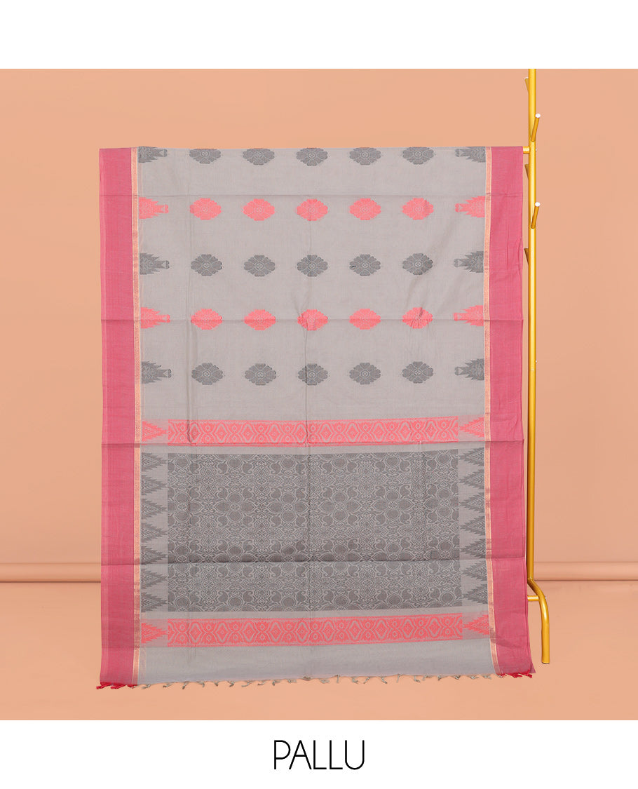 Grey Coimbatore Cotton Saree, Decked Up with Buttas, a Contrast Temple Border, a Pallu of Intricate Design, and a Matching Blouse