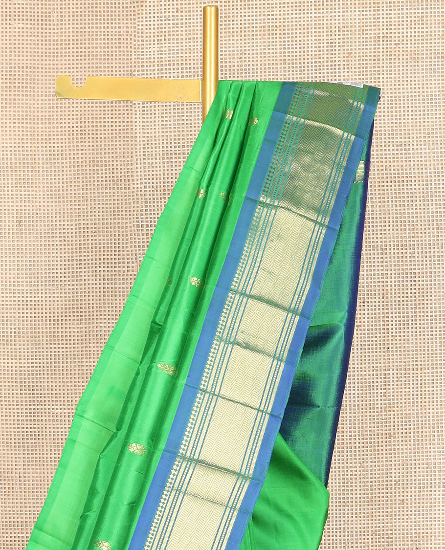 Green zari buttas kanchipuram silksaree, contrast one-sided border of paneer sombu,banaras,muthu & vanki & zari design pallu