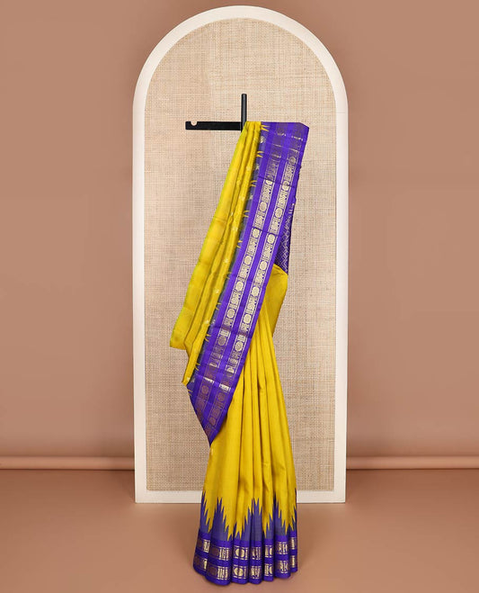 Yellow zari buttas kanchipuram silk saree, contrast rettai pettu one-sided annam chakram border & jaal design pallu