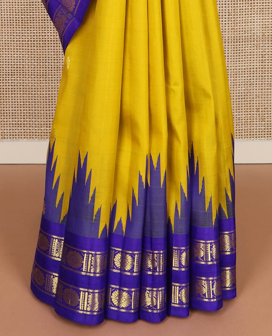 Yellow zari buttas kanchipuram silk saree, contrast rettai pettu one-sided annam chakram border & jaal design pallu