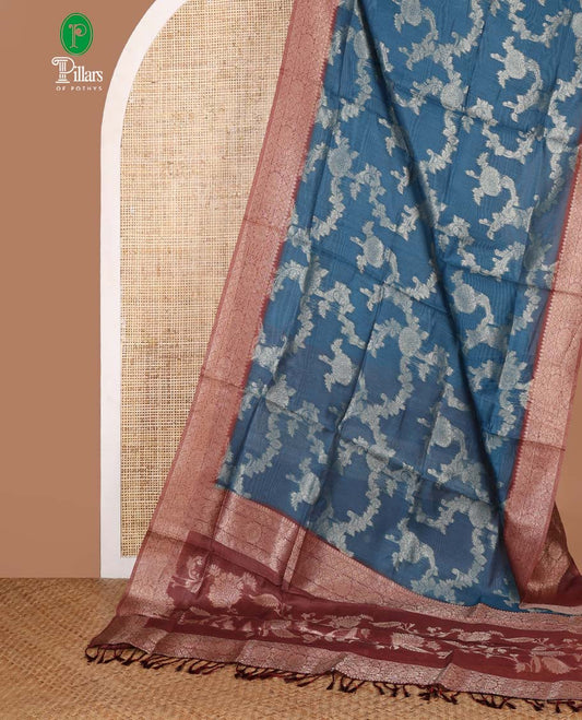 Blue jaal zari weaving banaras brasso saree with contrast jacquard border & rich weaving pallu along with butta design blouse