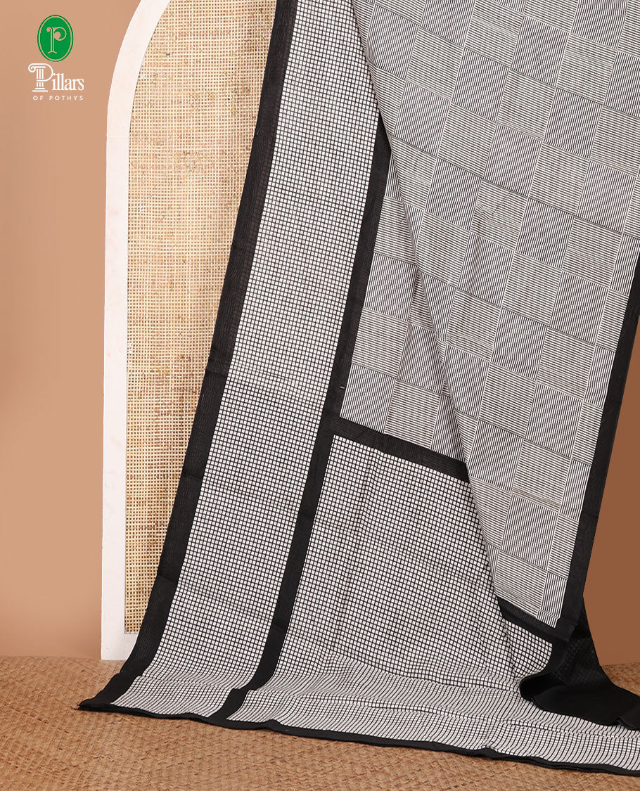 White and black artisans handblock printed jute cotton saree, micro-checked printed border & pallu, plain black blouse
