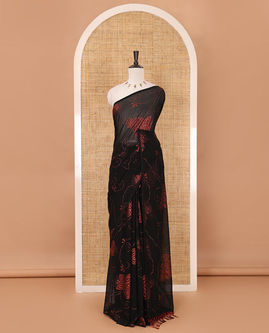 Borderless black 60 gm georgette saree features floral vine designs green glitter embroidery work, contrast plain blouse