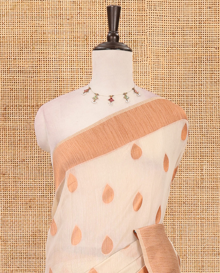 Cream copper zari thilakam motifs woven Tissue chanderi saree, gold zari bavanji border, plain pallu & brocade blouse