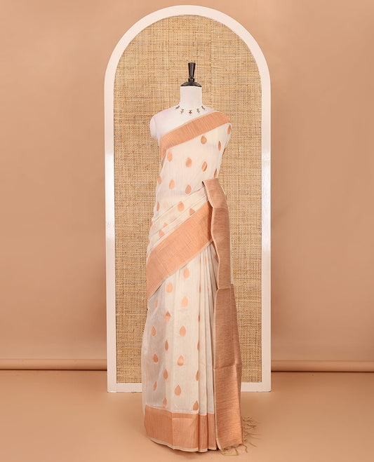 Cream copper zari thilakam motifs woven Tissue chanderi saree, gold zari bavanji border, plain pallu & brocade blouse