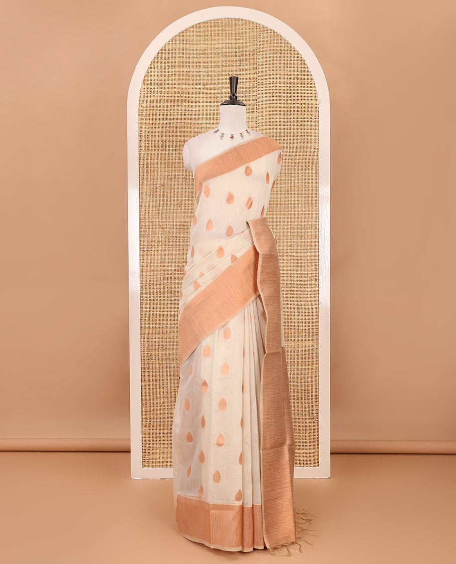 Cream copper zari thilakam motifs woven Tissue chanderi saree, gold zari bavanji border, plain pallu & brocade blouse