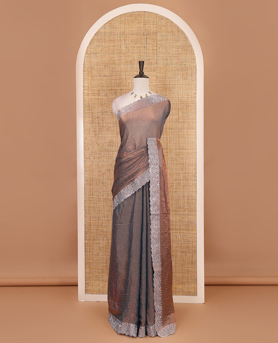 Grey Swarovski crystal stone embedded fendy chiffon saree, scallop border accentuated with floral and scallop design in Swarovski stones