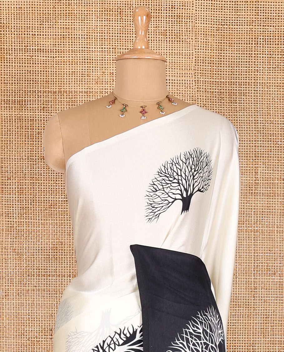 Half-white tree motifs digitally printed Gajji silk saree with contrast printed border of upside down tree motifs, and contrast printed blouse