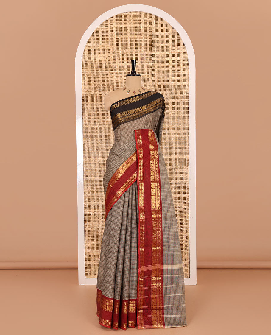 Beige plain chettinad cotton saree, contrast traditional zari rettai pettu ganga jamuna border, striped pallu, and a matching blouse