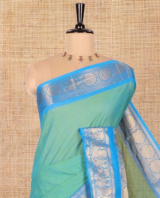 Blue Plain Chettinad Cotton Saree, Complemented by Contrast Rettai Pettu Traditional Zari Border of Peacock Chakram Designs, Pallu of Stripes, and Paired with a Matching Blouse