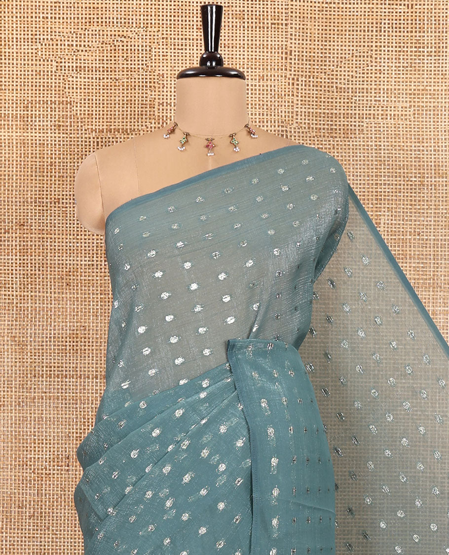 Borderless Blue Shimmer Saree, Subtly Sparkled with Zari Buttas All Over Its Body, Pallu Mirrors the Same Buttas, and Comes Without a Blouse