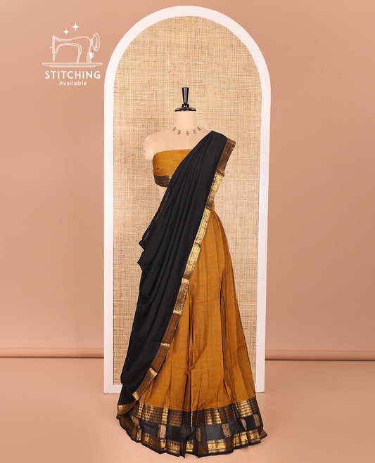 Mustrad and Black Sungudi Cotton Half-Saree Featuring Plain Skirt, Adorned with a Contrast Traditional Motifs Woven Zari Border of Annam Motifs, Paired with a Matching Blouse, and Contrast Syska Georgette Dhavani with Zari Border