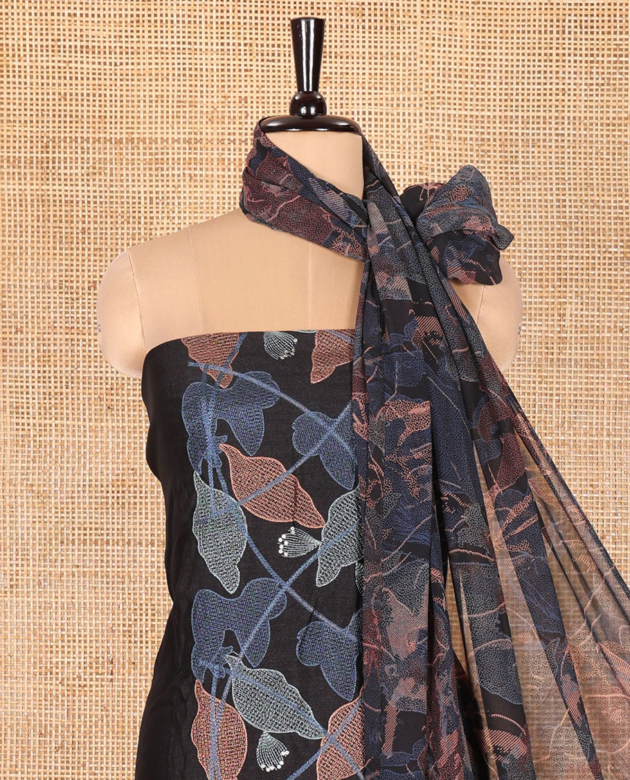 Black Vichitra Silk Designer Material Chudidar Set, Elegantly Embellished with Floral Cross-Stiched Embroidered Top, A Subtly Plain Santoon Bottom, and Paired with a Georgette Abstract Printed Dupatta