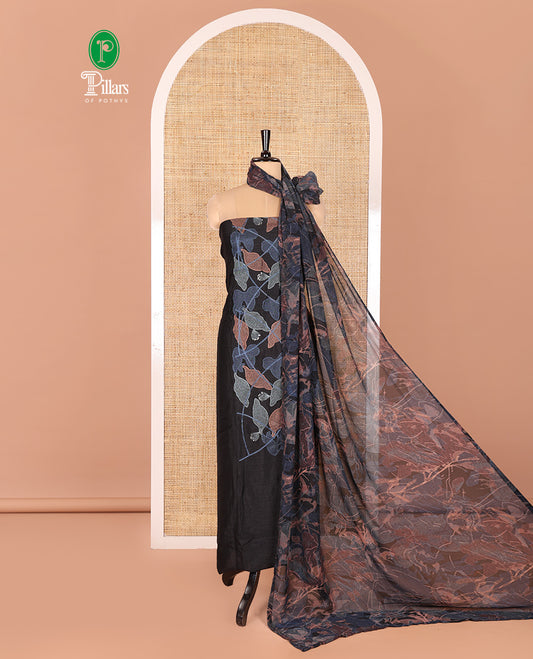 Black Vichitra Silk Designer Material Chudidar Set, Elegantly Embellished with Floral Cross-Stiched Embroidered Top, A Subtly Plain Santoon Bottom, and Paired with a Georgette Abstract Printed Dupatta