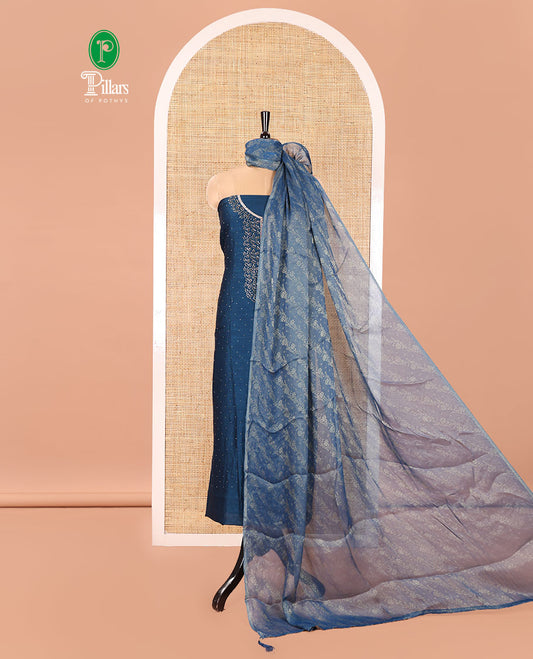 Blue Vichitra Silk Material Churidar Set, Gleamed Up with Swarovski Stone Work and Neck Work Top, Comes with a Plain Santoon Bottom, and Is Paired with Nc Moss Organza Floral Jaal Design Dupatta