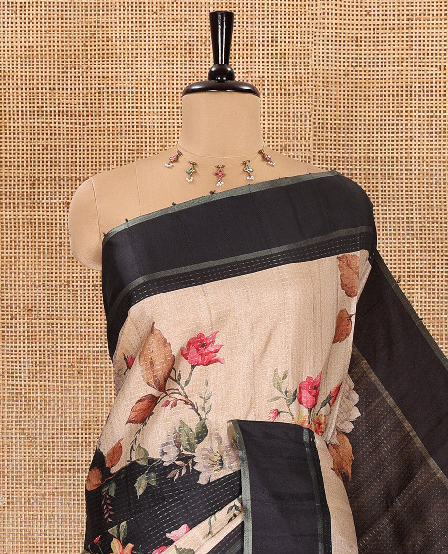 Black floral printed fancy tussar saree, contrast small zari border, and zari design pallu, and a contrast floral printed blouse