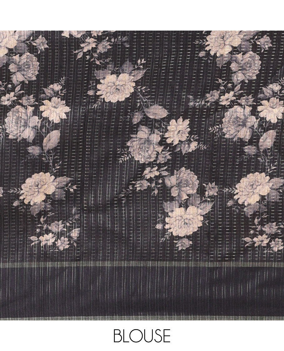 Black floral printed fancy tussar saree, contrast small zari border, and zari design pallu, and a contrast floral printed blouse