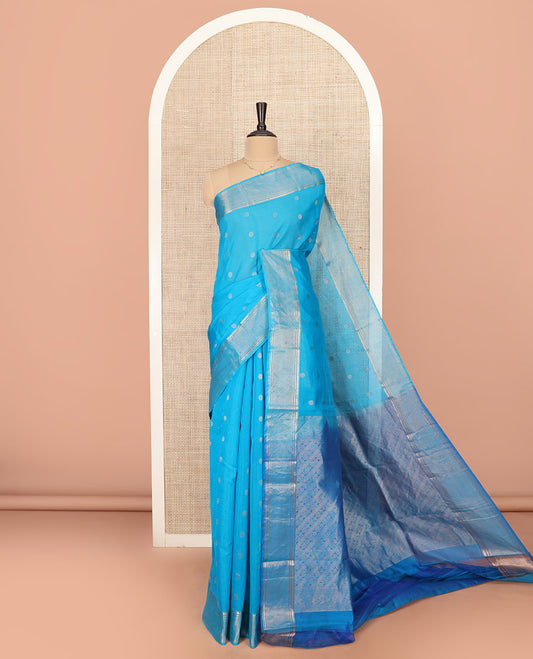 Blue Silk Cotton Saree Mesmerized with Polka Dot Buttas All Over the Body, Complemented by a Traditional Design Woven Border, Featuring a Pallu of Diagonal Designs, and Paired with a Contrast Blouse