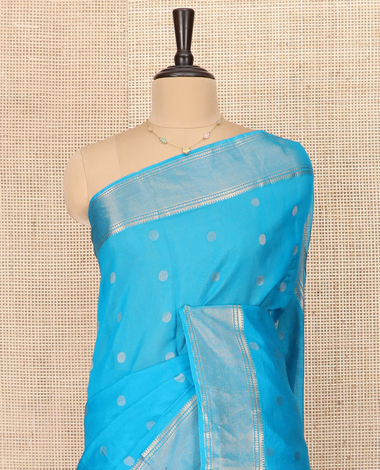 Blue Silk Cotton Saree Mesmerized with Polka Dot Buttas All Over the Body, Complemented by a Traditional Design Woven Border, Featuring a Pallu of Diagonal Designs, and Paired with a Contrast Blouse