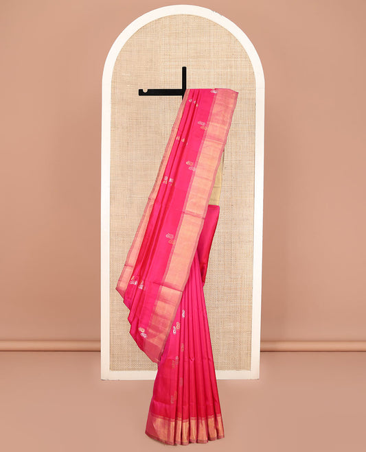 Pink Uppada Silk Saree, Graced with Zari Buttas All Over Its Body, Highlighted by a Zari Bavanji Border, Captivating Contrast Pallu of Zari Buttas, and Paired with a Contrast Blouse