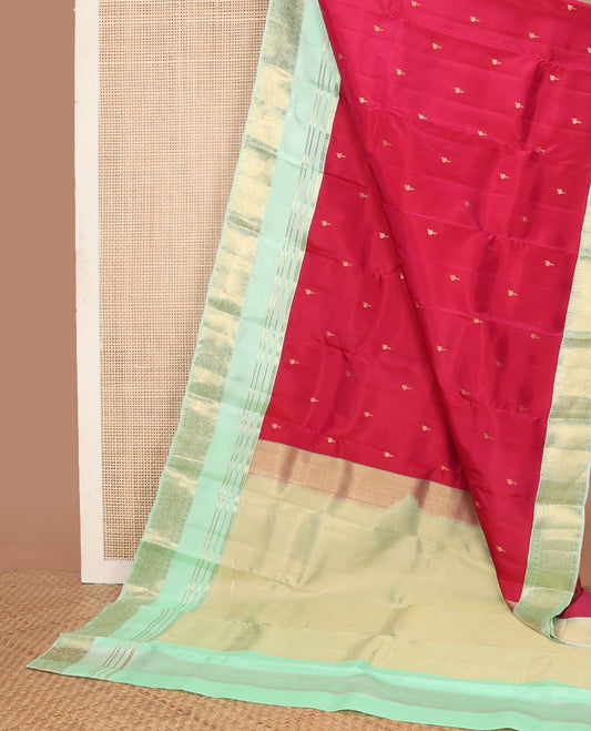 Red vasundhara elite saree with zari buttas, contrast rettai pettu border of neli,muthu,kamalam & kodi mayil & pallu of jaal designs