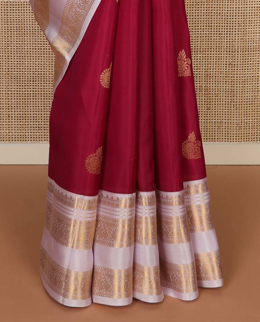 Red zari buttas Vasundhara silk mix saree, contrast border rettai pettu of thilakam, muthu, cross kamalam, neli, and mayil designs, and intricate pallu