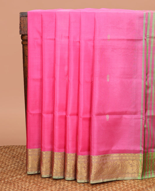 Pink Banana Pith Saree, Enriched with Buttas All Over Its Body, Complemented by a Contrast Border of Floral and Peacock Zari Designs, Pallu Steeped with Stripes and Buttas, and Paired with a Contrast Blouse