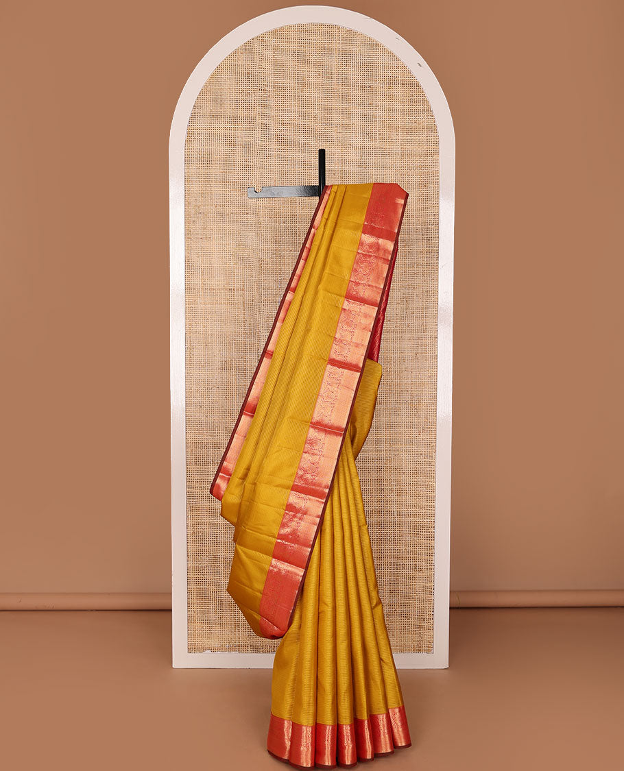 Yellow zari striped silk saree, contrast jaal pallu & zari border of muthu, kodi visiry, mayil & vanki designs