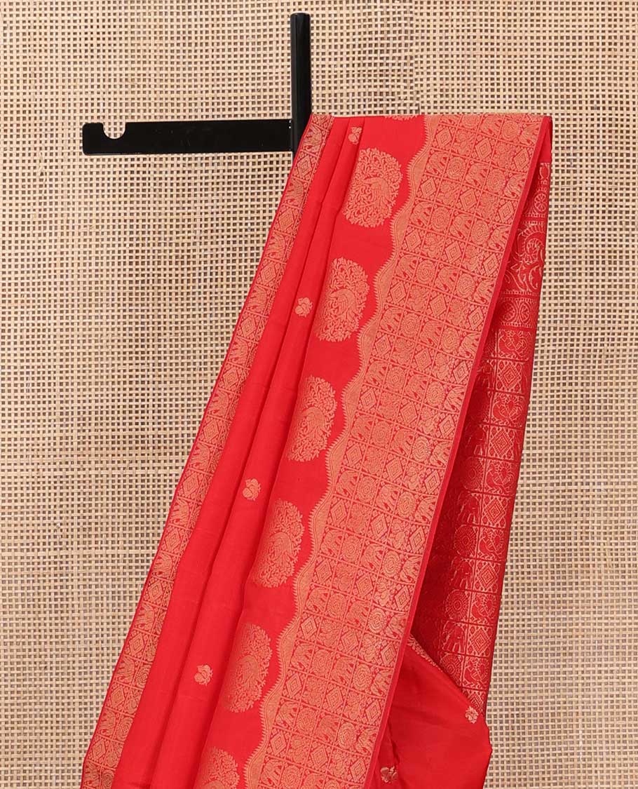 Red zari buttas silk saree, zari border and pallu of yanaai, diamond, chakram and mayil buttas enclosed checks