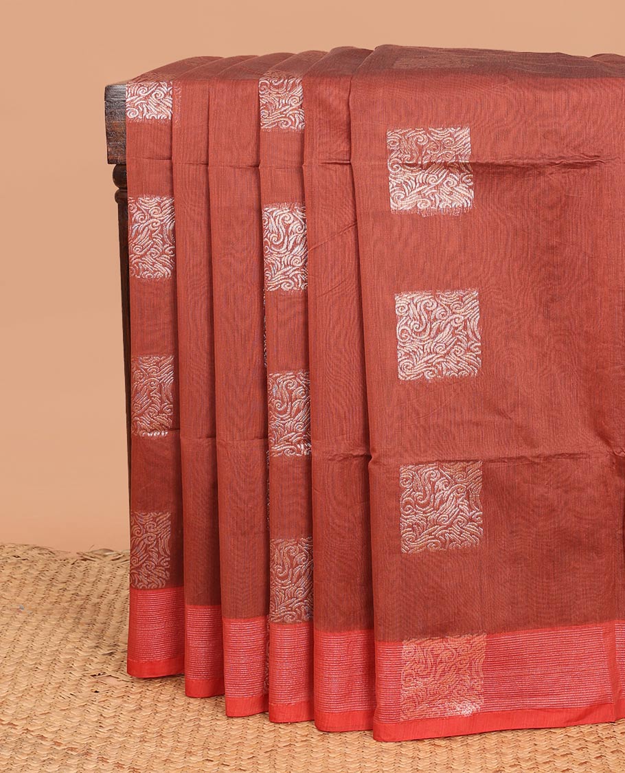Burnt umber square buttas woven semi-silk cotton saree, contrast zari buttas woven border, and intricate pallu