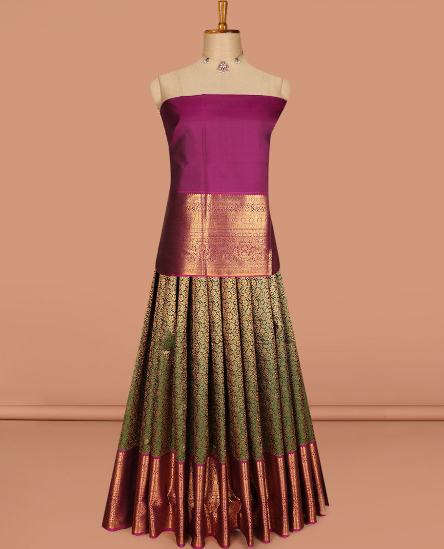 Green pure-silk half-saree, floral jacquard skirt, contrast blouse, and border of salangai, muthu, kamalam, kodi visiry and traditional designs, and intricate dhavani