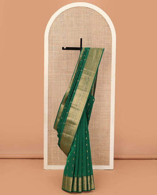 Green zari buttas Vasundhara silk mix saree, zari border of rekku, muthu, mayil kann, and kodi visiry and jaal pallu