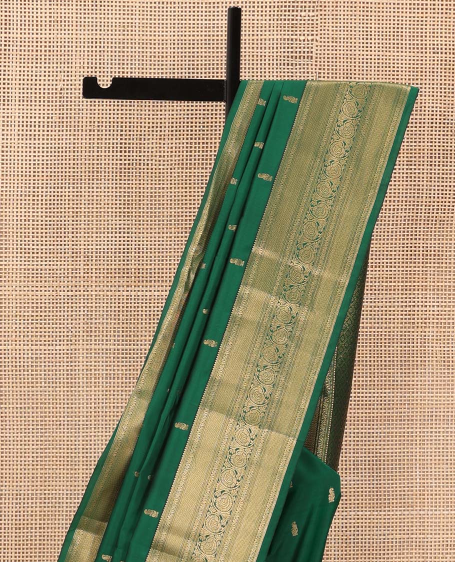 Green zari buttas Vasundhara silk mix saree, zari border of rekku, muthu, mayil kann, and kodi visiry and jaal pallu