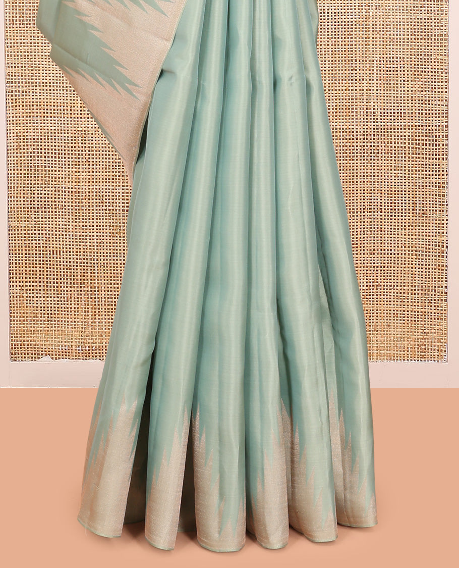 Turqoise Plain Vasundhara Lite Silk Mix Saree, a Zari Thazhampoo Rekku Border, Grand Jaal Pallu, and a Matching Blouse