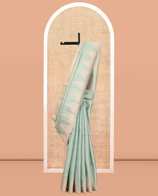 Turqoise Plain Vasundhara Lite Silk Mix Saree, a Zari Thazhampoo Rekku Border, Grand Jaal Pallu, and a Matching Blouse