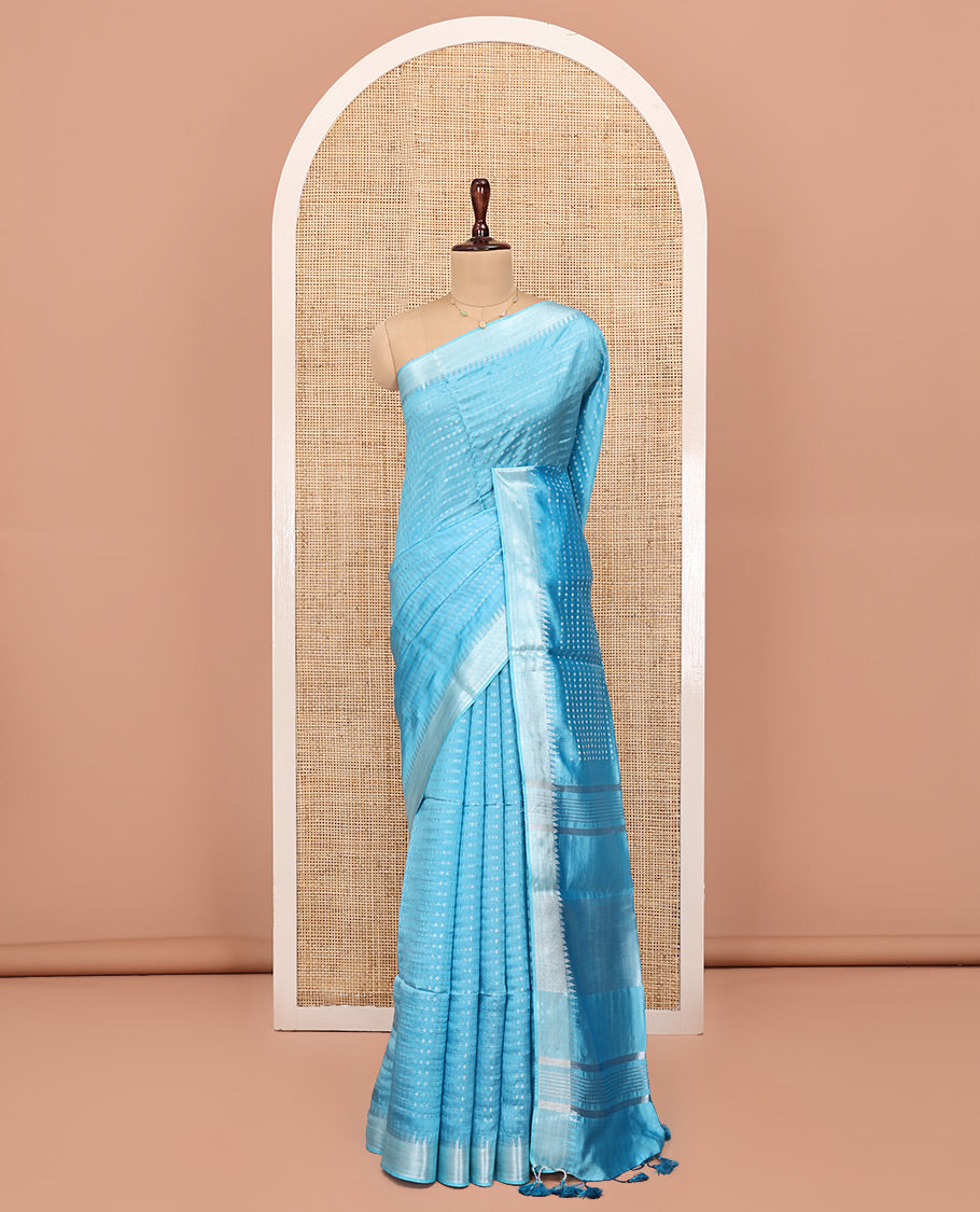 Blue Banana Pith Saree, Sparsely Woven with Buttas All Over Its Body, Highlighted by Zari Temple Border, Gleaming Zari Striped Pallu, and Paired with a Matching Blouse
