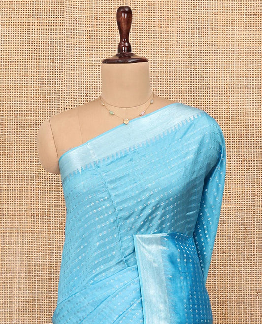 Blue Banana Pith Saree, Sparsely Woven with Buttas All Over Its Body, Highlighted by Zari Temple Border, Gleaming Zari Striped Pallu, and Paired with a Matching Blouse