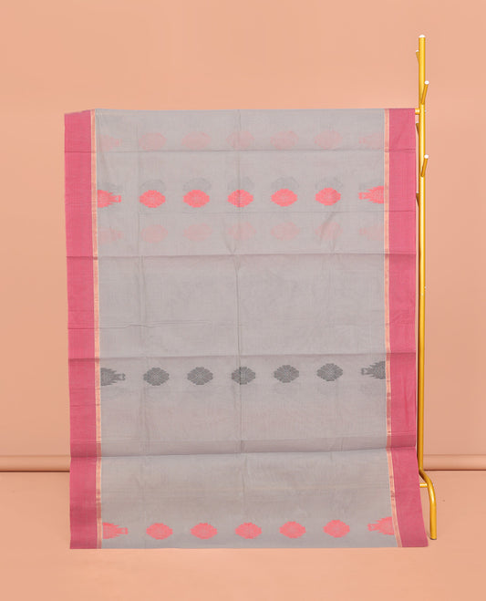 Grey Coimbatore Cotton Saree, Decked Up with Buttas, a Contrast Temple Border, a Pallu of Intricate Design, and a Matching Blouse