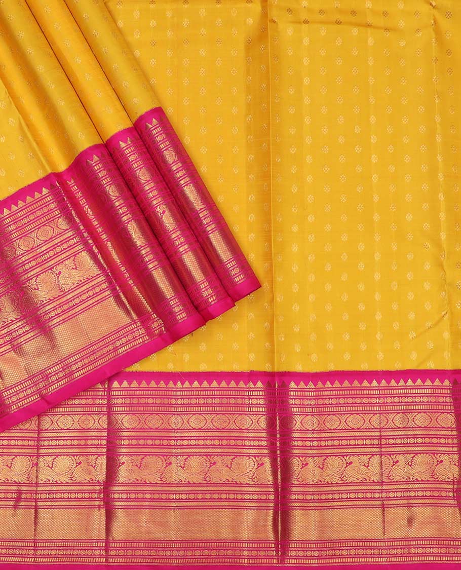Yellow pure silk half saree, kamalam buttas skirt, contrast border, and blouse of rekku,muthu,kathir,chakram,mayil and kuyil kann, and zari checked dhavani