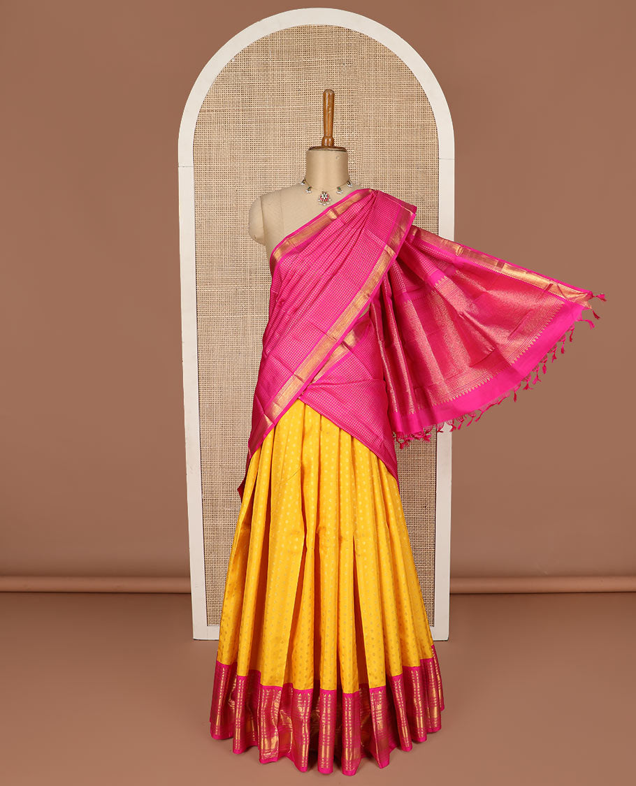 Yellow pure silk half saree, kamalam buttas skirt, contrast border, and blouse of rekku,muthu,kathir,chakram,mayil and kuyil kann, and zari checked dhavani