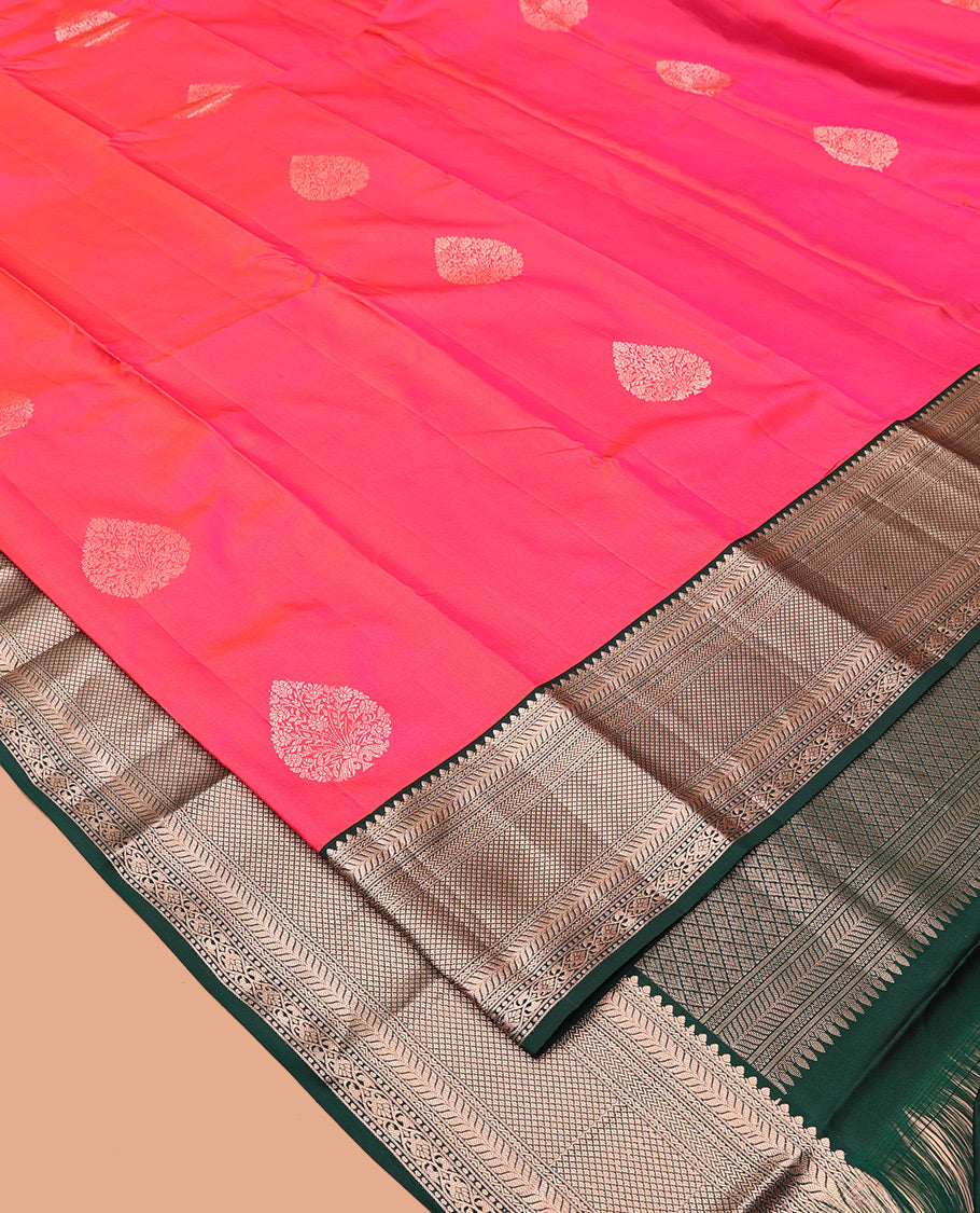 Pink Vasundhara Silk Saree, Gleamed Up with Zari Buttas All Over Its Body, Complemented by a Contrast Border of Kathir, and Jaal Designs, Grand Jaal Pallu, and Paired with a Contrast Blouse