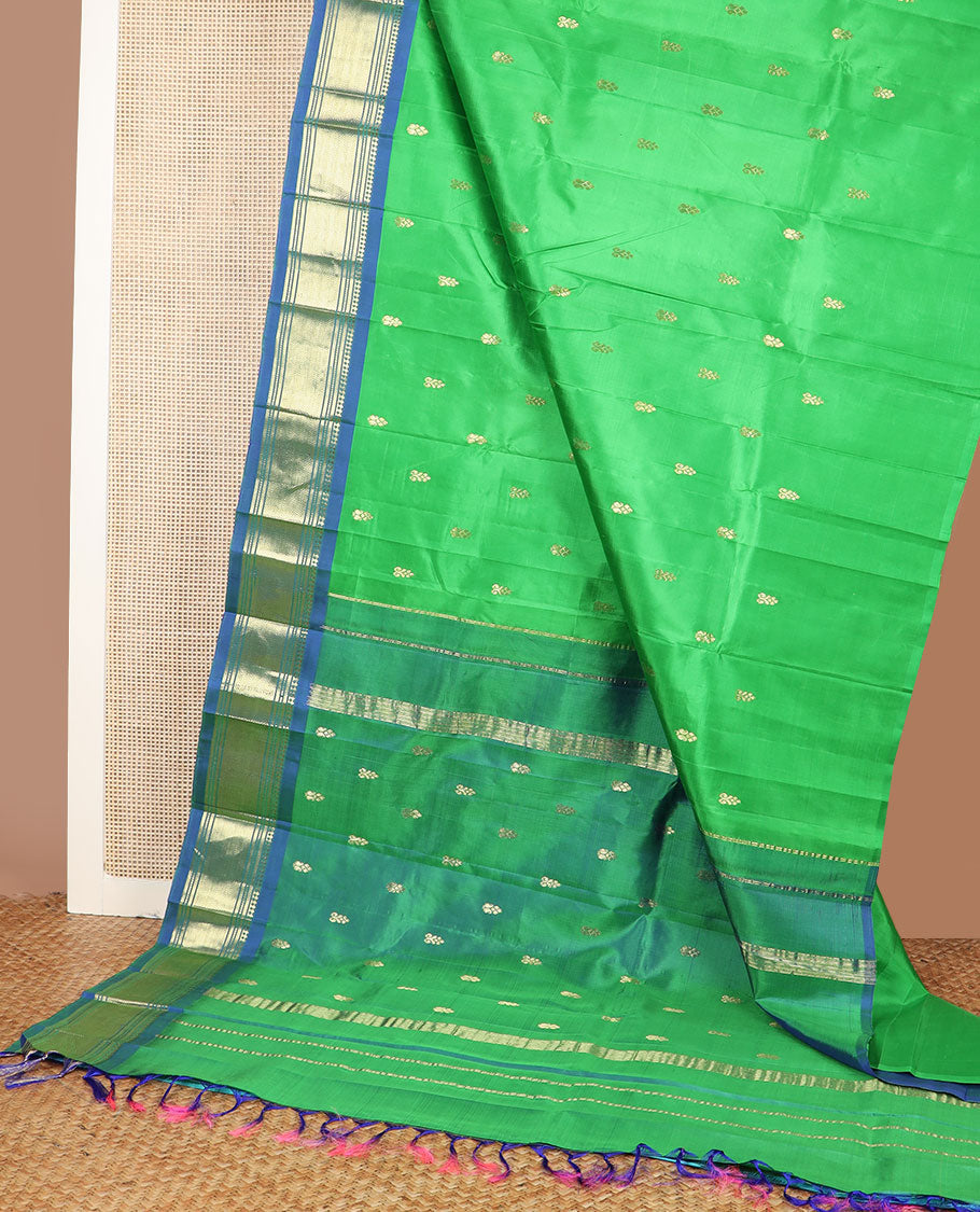 Green zari buttas kanchipuram silksaree, contrast one-sided border of paneer sombu,banaras,muthu & vanki & zari design pallu
