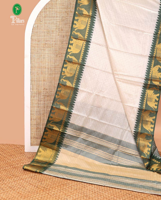 White zari checked design dola silk saree with contrast elephant design border & chit pallu along with checked design blouse