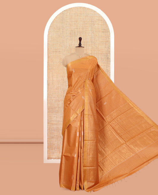 Grey Tussar Saree, Styled with Warli Buttas, a Subtle Zari Border, Pallu of Warli Weave, and a Matching Blouse